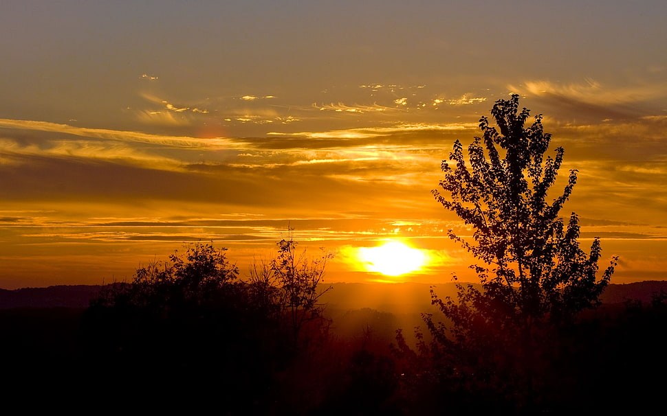 sunset behind clouds HD wallpaper